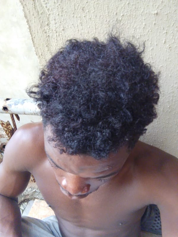 Man's afternoon activities documented across residential Alor, Nigeria