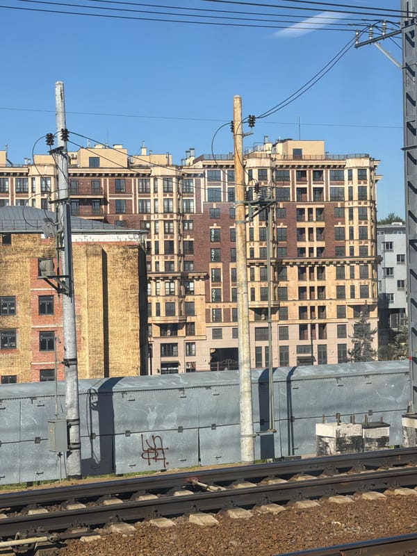 Moscow rail corridor: murals, architecture, and early morning commuters