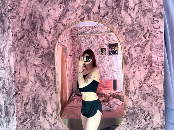 Woman takes mirror selfies in Moldova bedroom Friday morning