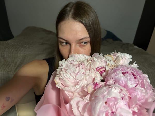 Pink peonies and mirror selfies in a Perm apartment