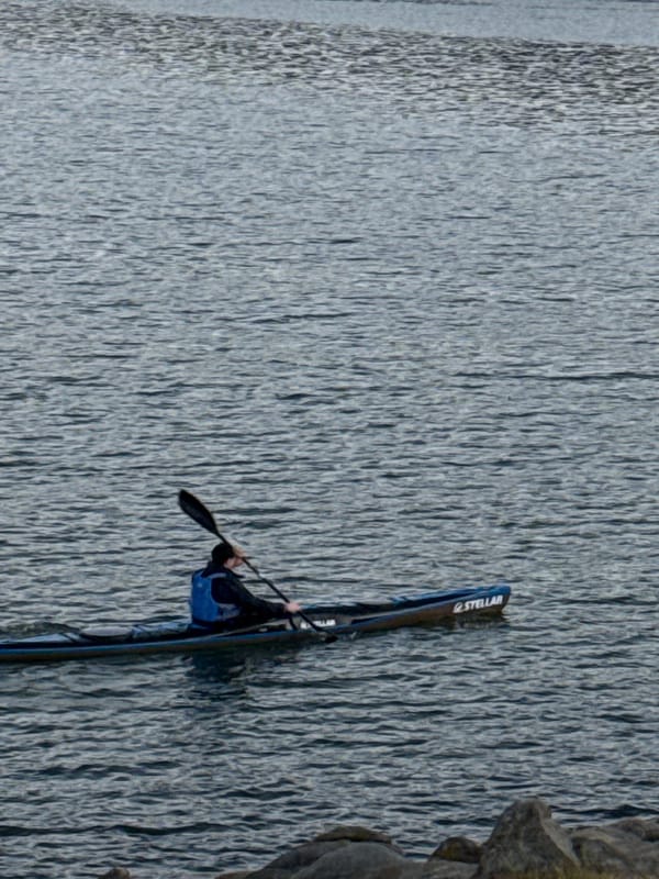 Kayaking and evening lake activities observed near Pancharevo, Bulgaria