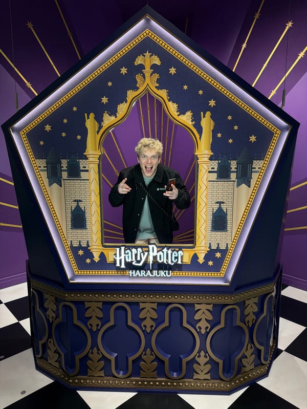 Tourist photos and nighttime street activity in Shibuya