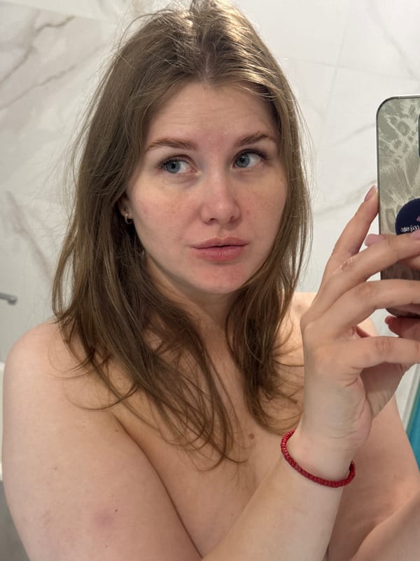 Woman takes bathroom selfies in Ferma, Russia