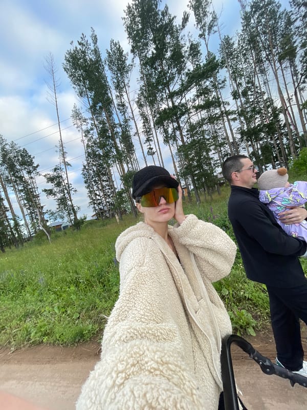 Afternoon stroll with a stroller through Podshivalovo's pine roads