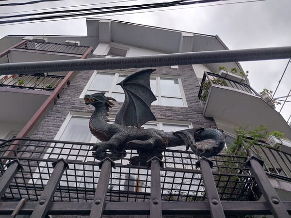 Tourist photographs historic landmarks and parks in Sochi