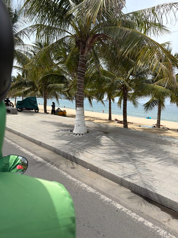 Scooter ride along Nha Trang's coastal beachfront road