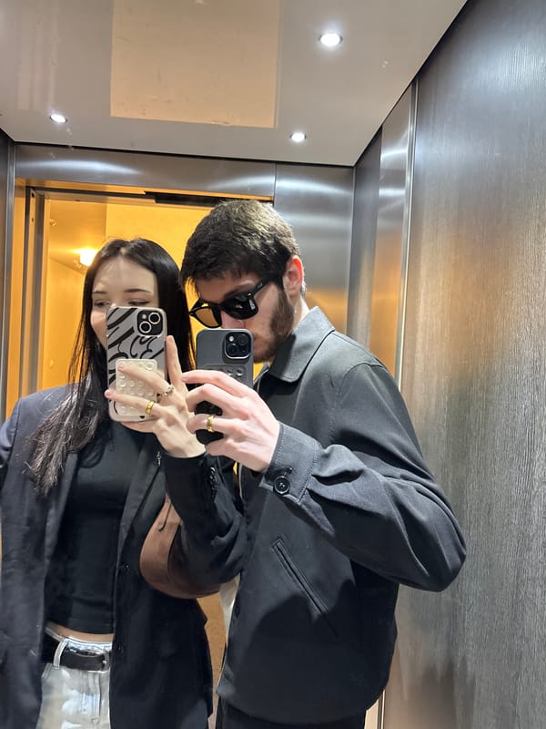 Couple takes selfies in elevator in Cachan, France