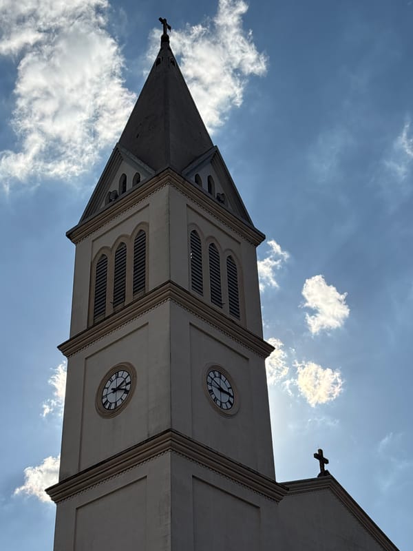 Church spires, flags, and street scenes across São Paulo