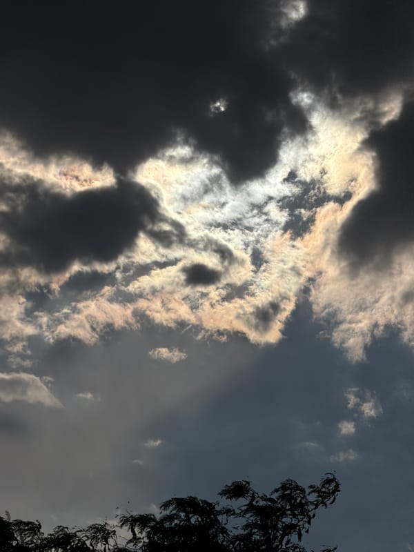 Sun breaking through dramatic cloud cover over Chirchik