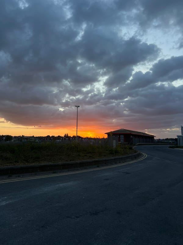 Sunset observed over Great Yarmouth with orange yellow sky