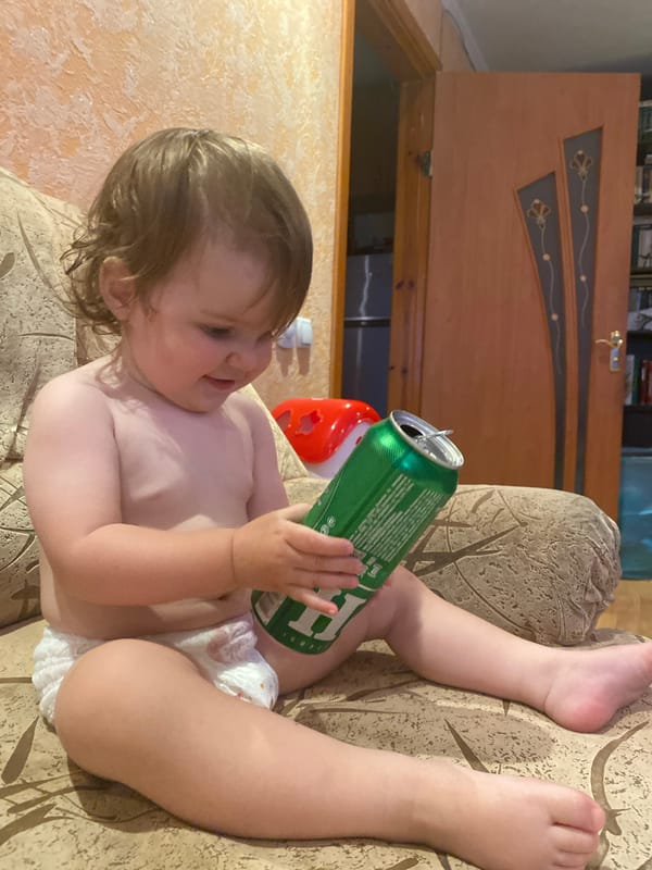 Baby and toddler moments at home, with selfies and a cat