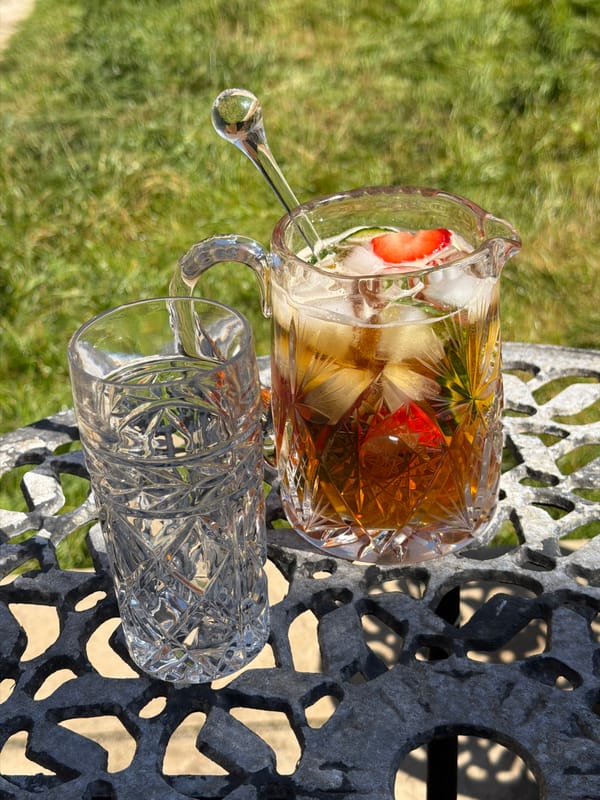 Outdoor refreshments served on decorative table in Kent district