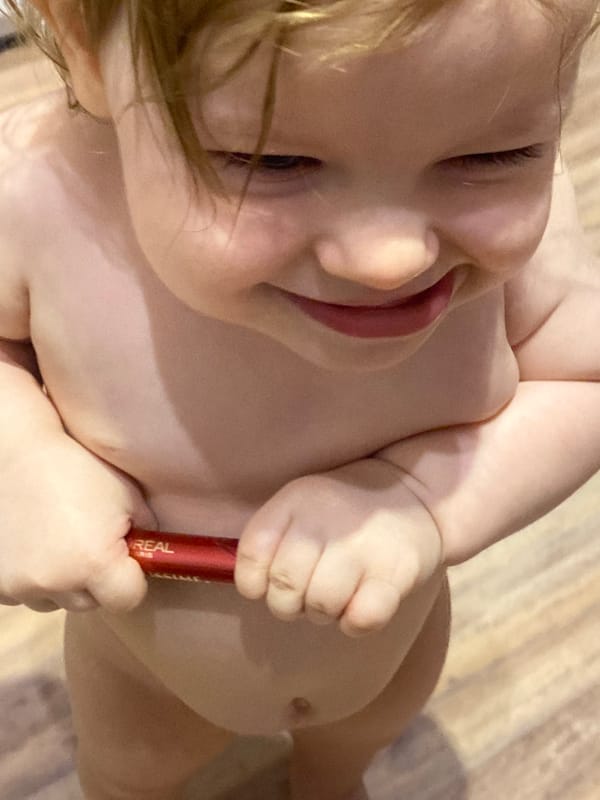 Family moments with toddler, grapes, pet bird documented Krasnodar