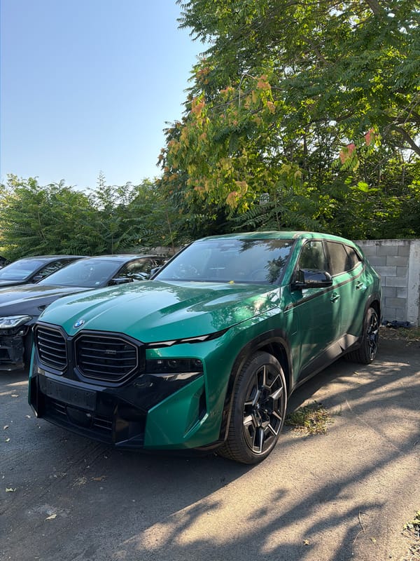 Green BMW XM parked in Burgas, Bulgaria