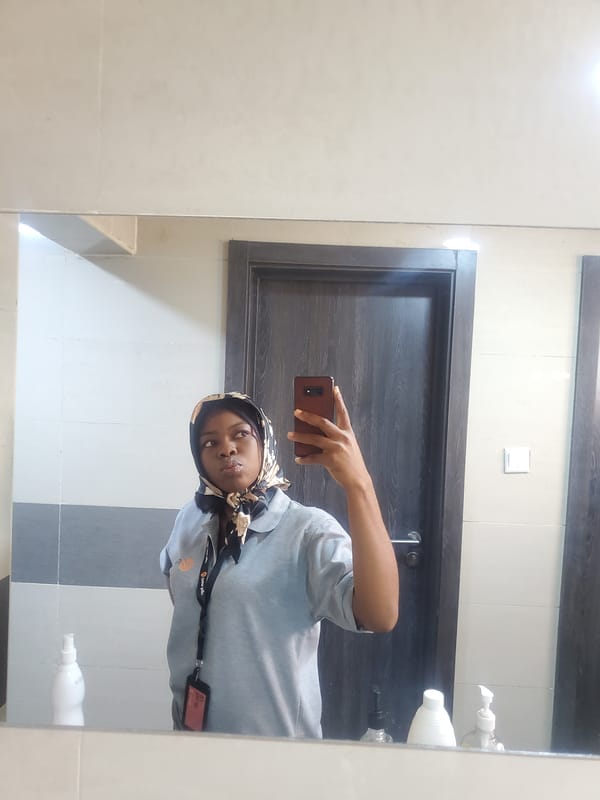 Employee documents routine workday at Olam Agri facility Nigeria