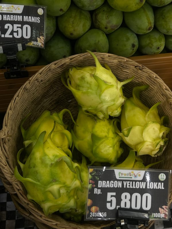 Green mangoes displayed at North Kuta market Monday morning