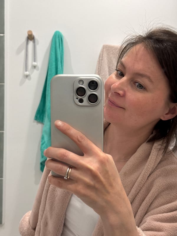 Woman documents evening routine with selfies in Izhevsk apartment