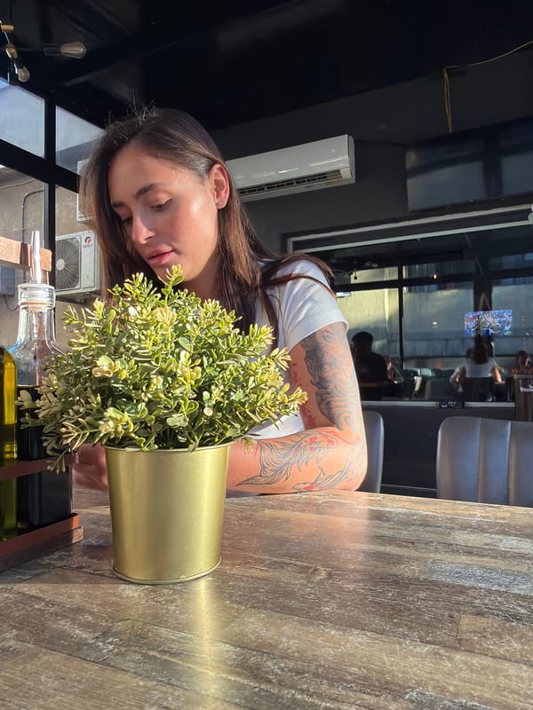 Woman enjoys playful dining moment in Pernik restaurant
