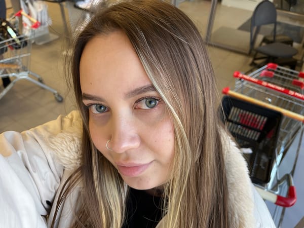 Two women enjoy outdoor spring afternoon in Novopokrovskaya, Russia