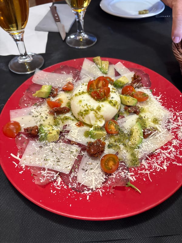 Burrata salad photographed at Spanish coastal restaurant