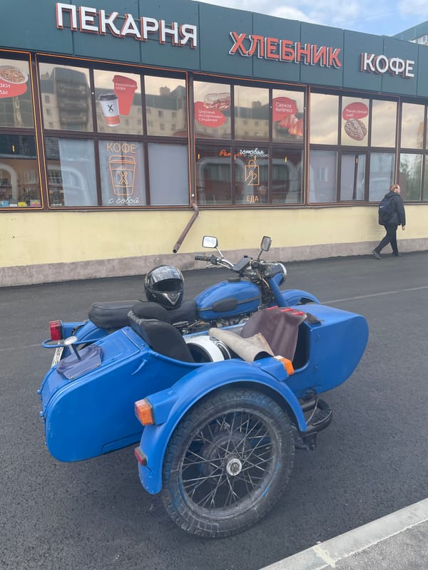 Street scenes and blue motorcycle documented in Saint Petersburg