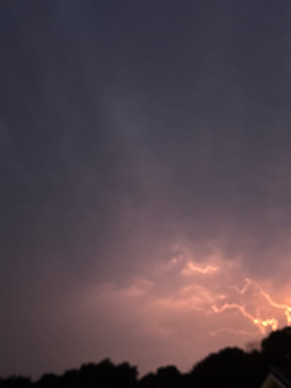 Lightning and a full moon over Putten during a summer storm