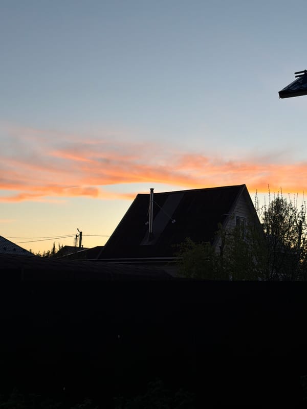 Dusk sunset observed over residential Vaskelovo, Russia