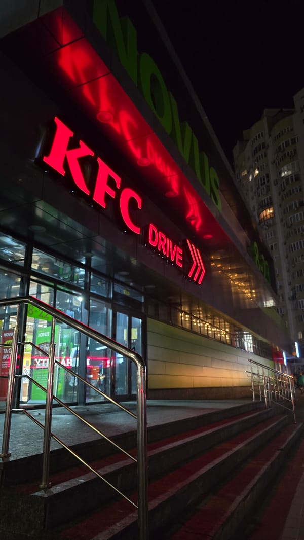 Evening scenes documented across Kyiv's urban waterfront and commercial districts