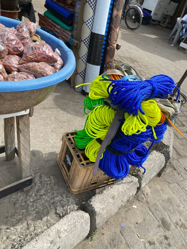 Street vendors conduct morning business in bustling Lekki, Nigeria