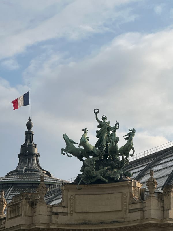 Bronze chariot sculpture photographed at Paris landmark