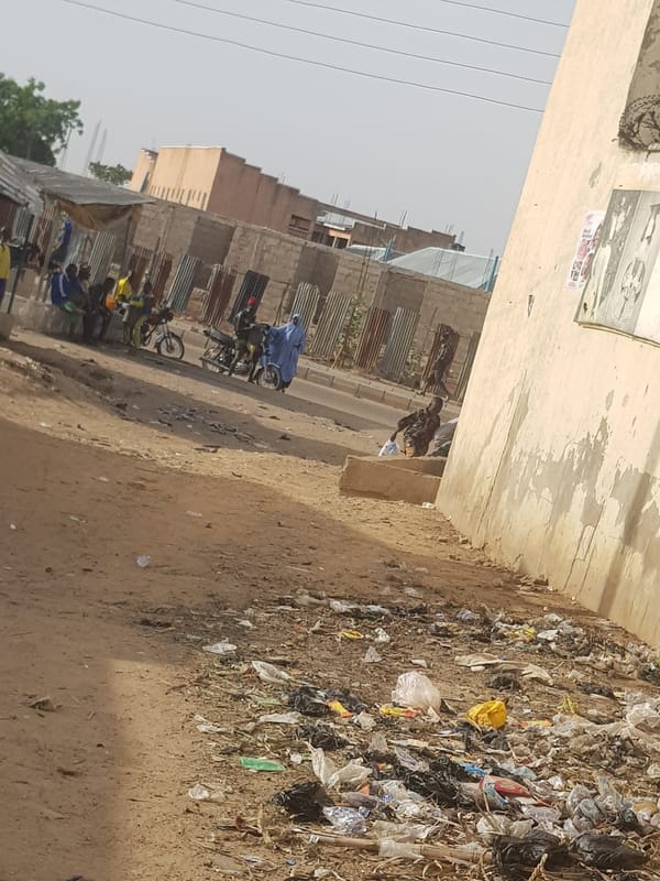 Daily street life documented in Dabawa, Nigeria afternoon scenes