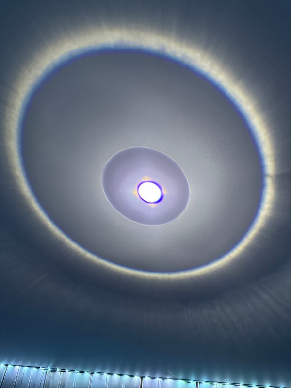Concentric light rings observed on wall in Rusalevka, Russia