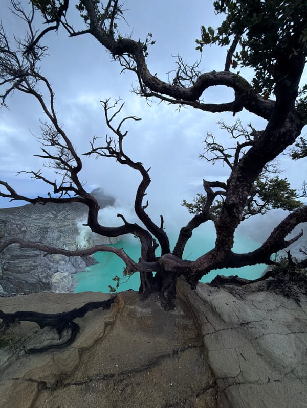 Tourists document evening visit to Indonesia's Ijen volcano crater