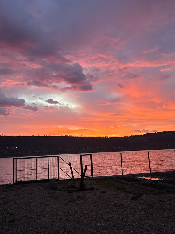 Colorful sunset observed over water in Irkutsk, Russia