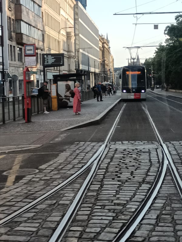 Tram tracks and cobblestones through Prague's historic streets