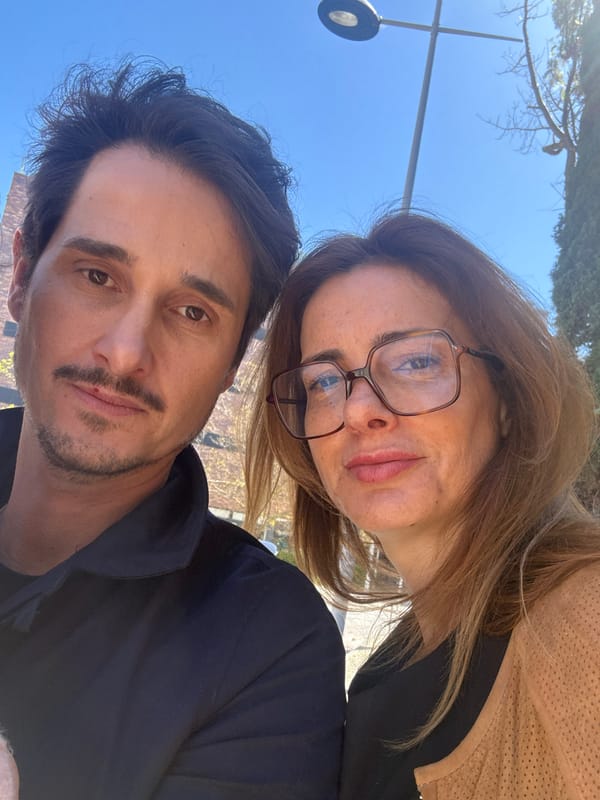 Couple takes selfies on sunny day in Lisbon