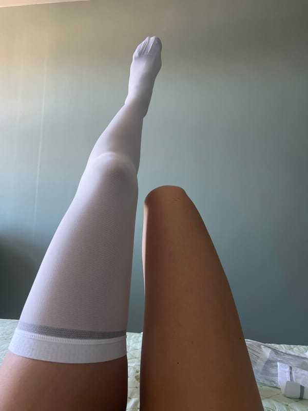 Person displays legs with compression stocking in Krasnoyarsk