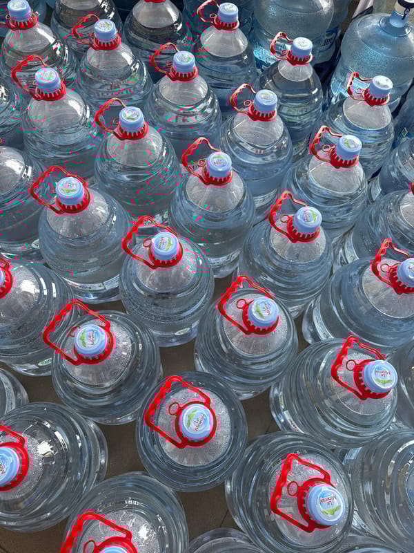 Water bottles arranged densely in Kuta Selatan, Indonesia