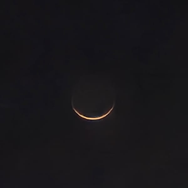 Evening sky and public gatherings observed in Fez