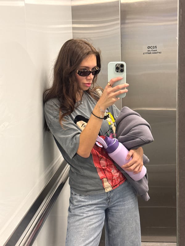 Woman takes selfie in Ramat Gan elevator