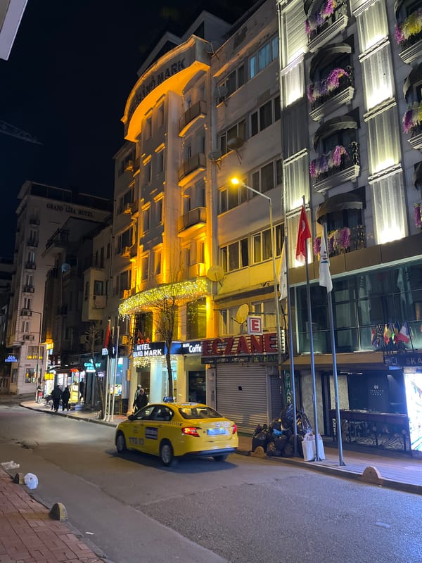 Evening street activity captured near Istanbul restaurant district