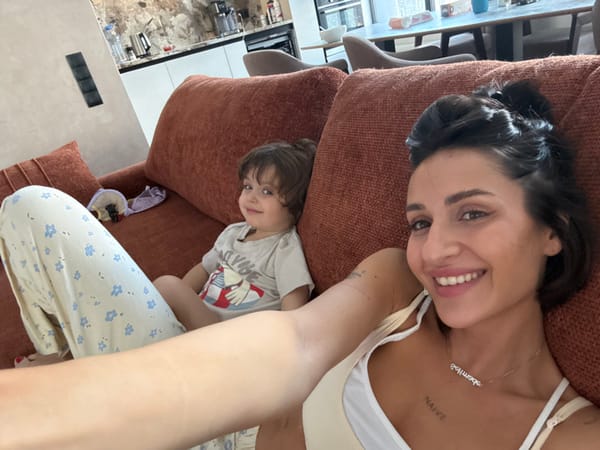 Morning routine captured: woman, child together in Khimki home