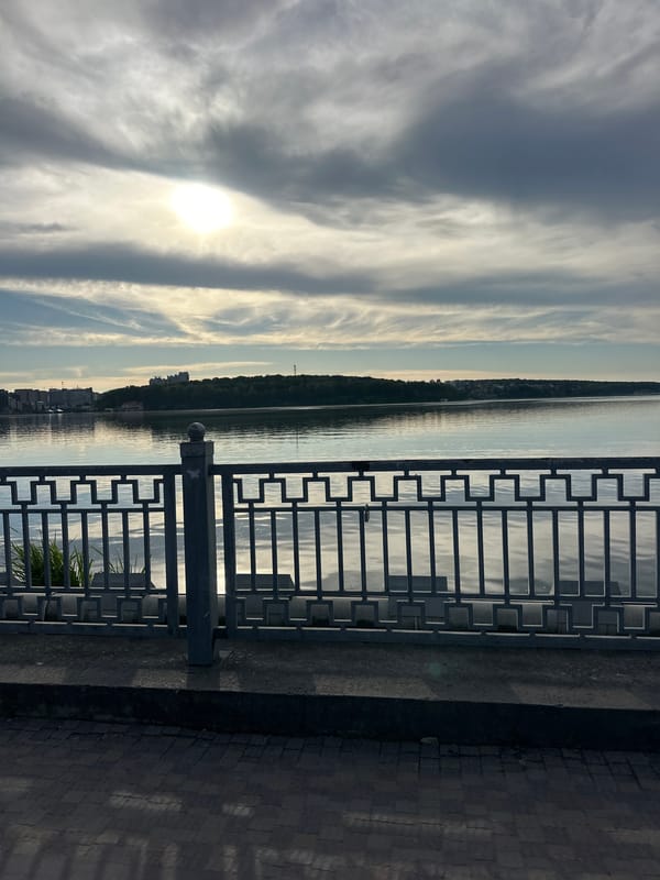 Afternoon leisure activities captured along Ternopil Lake waterfront promenade