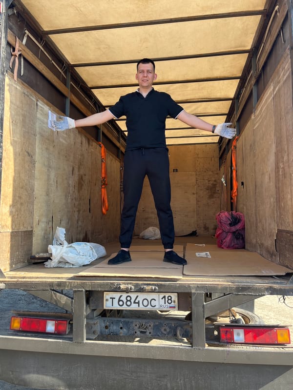 Couple with van documented during loading activity in Izhevsk