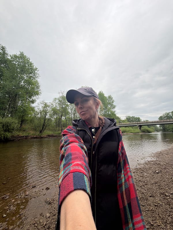 River outing documented in Russian towns during overcast morning