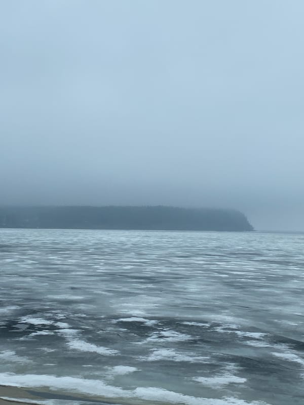 Spring ice patterns observed on water body in Chaikovsky