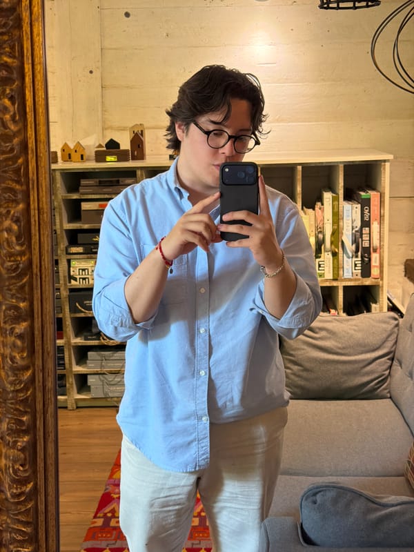 Person takes selfie in rustic interior space in Puebla