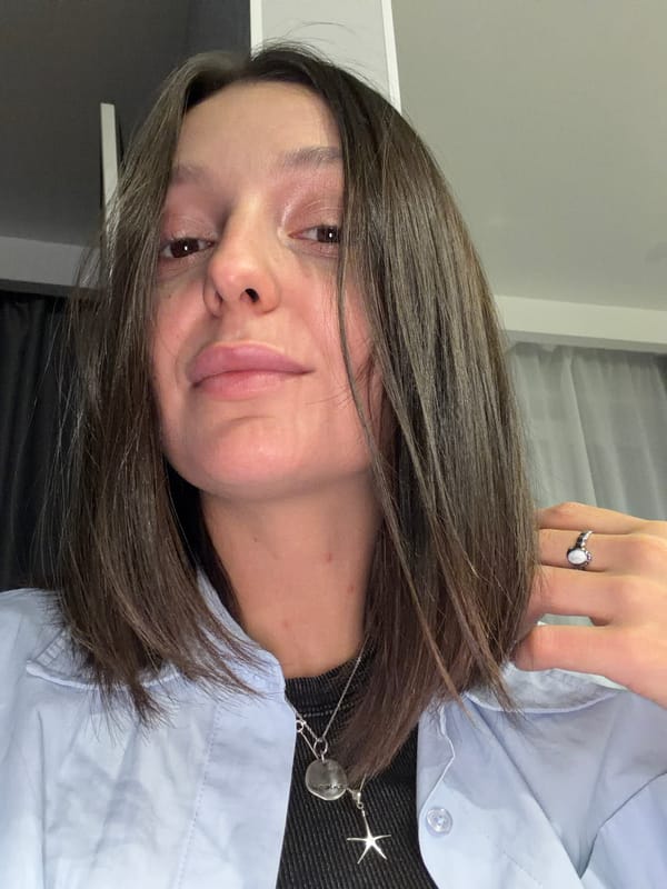 Woman in blue shirt photographed in Moscow