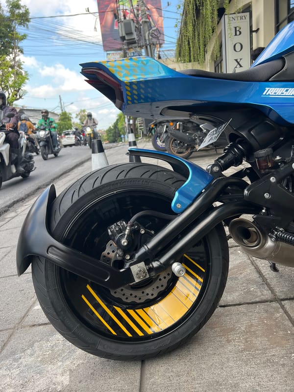 Custom blue motorcycle with yellow polka dots spotted in North Kuta