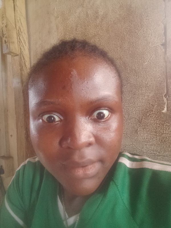 Person in green striped shirt observed in Iranla, Nigeria